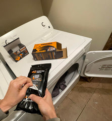 Dead Down Wind BLACK dryer sheets control scents and soften fabrics.