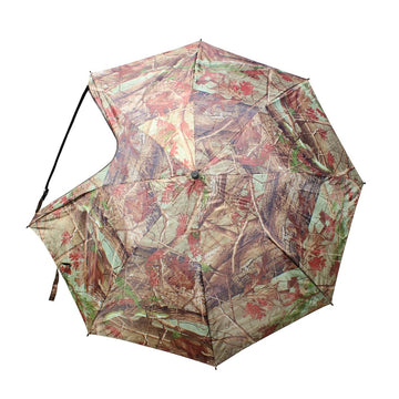 Dead Ringer camo rain shield extending over a hunting position.