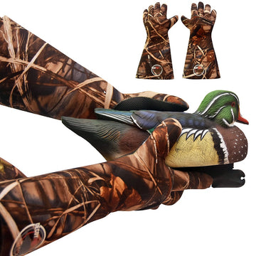 DecoyPro insulated camouflage gloves waterproof in action keep hands dry on marsh hunts.