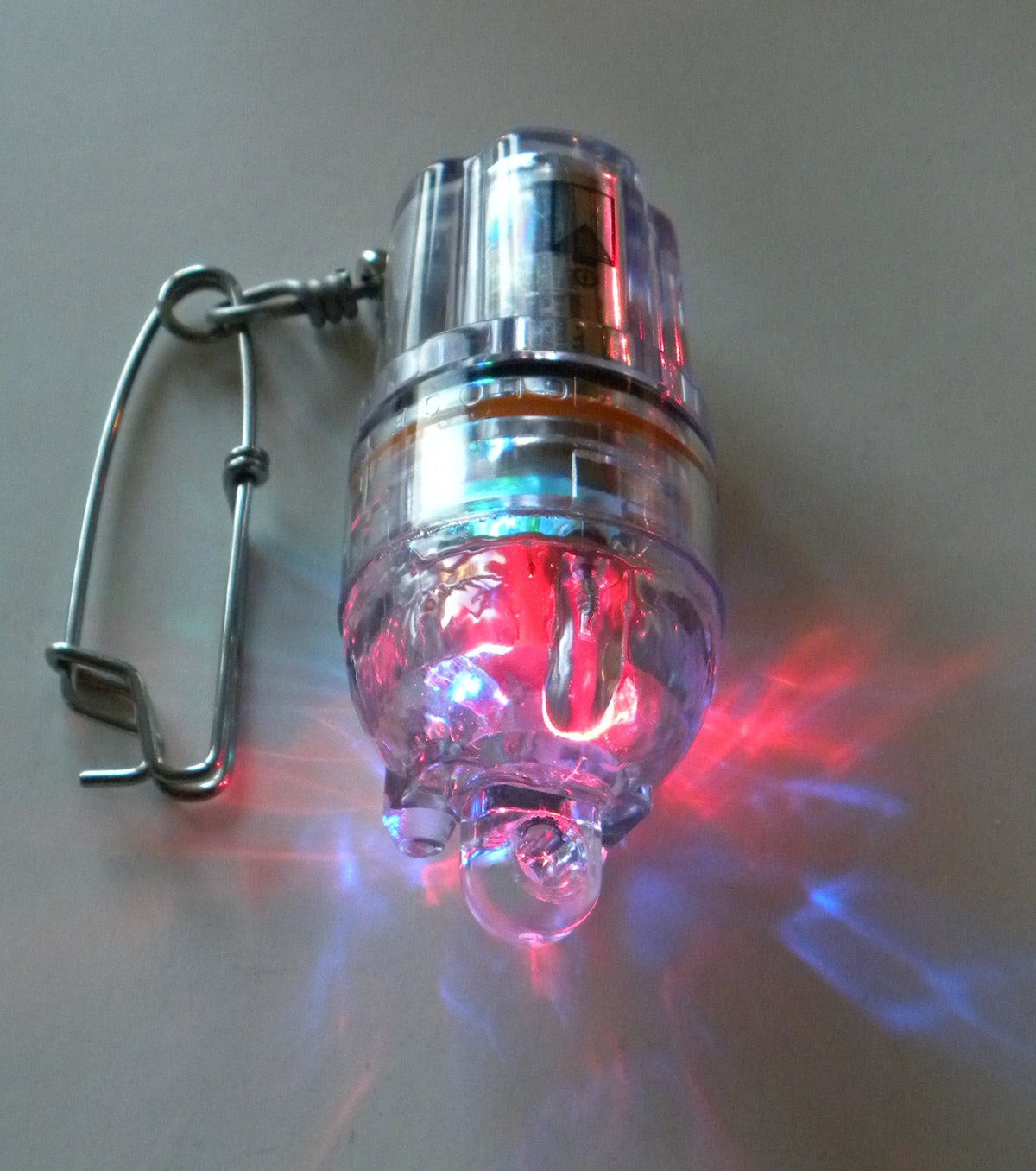 Deep Drop LED fishing light at 2,100 ft depth with disco colors