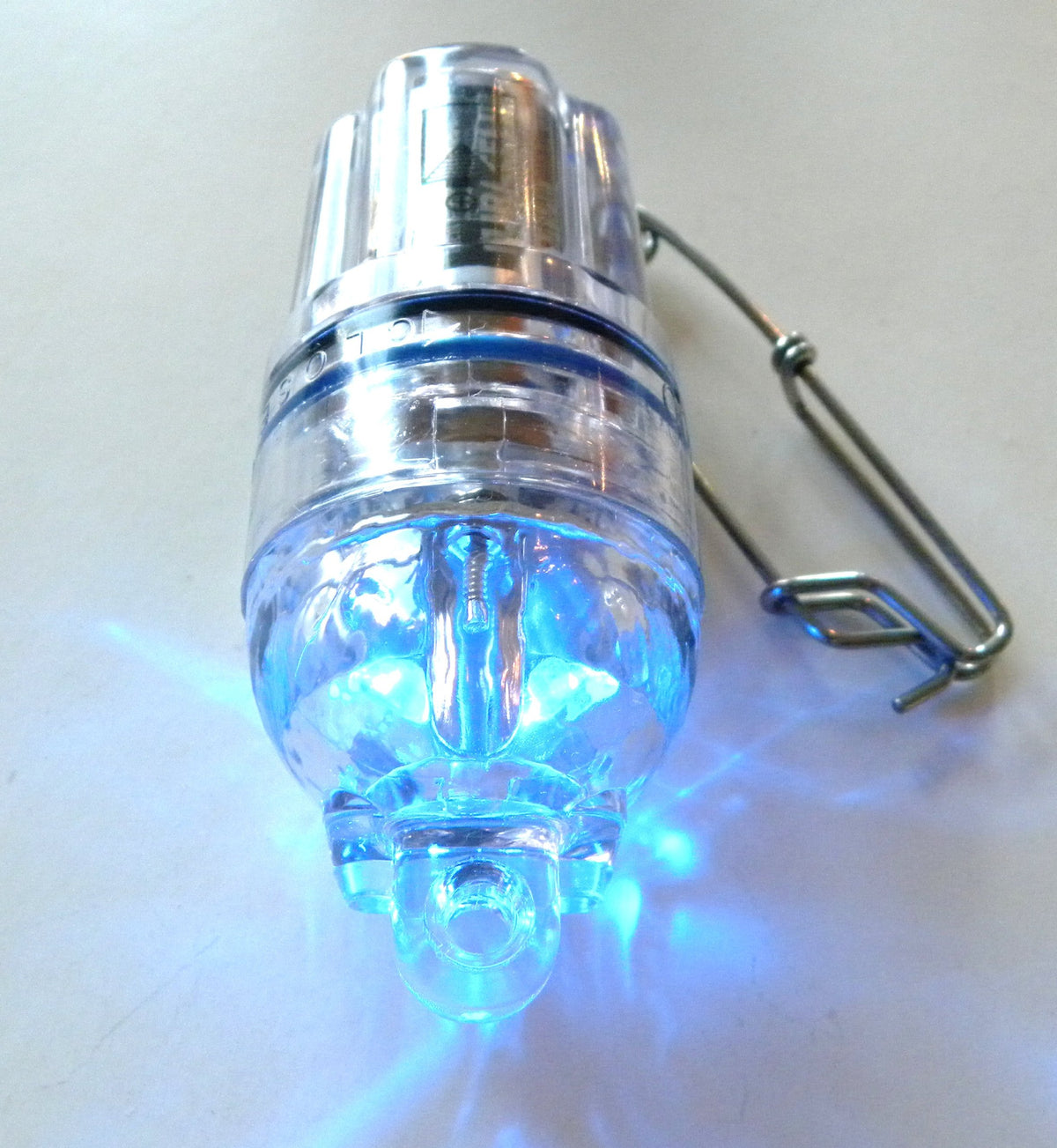 Deep Drop LED Fishing Light in blue, depth-rated to 2,100 ft, attracts fish and bait