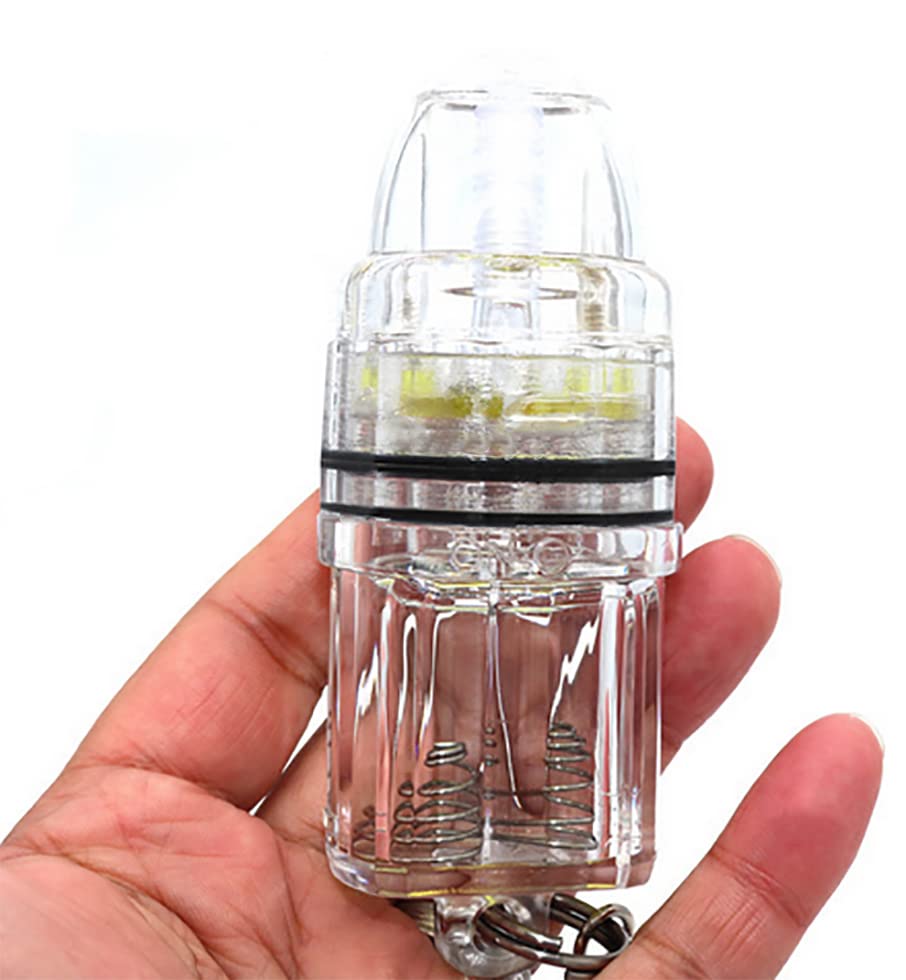 Water-activated green LED fishing light turning on in water