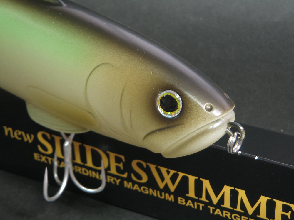 10 inches 6.5 oz Deps Silent Swimmer 250 held for scale