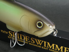 10 inches 6.5 oz Deps Silent Swimmer 250 held for scale