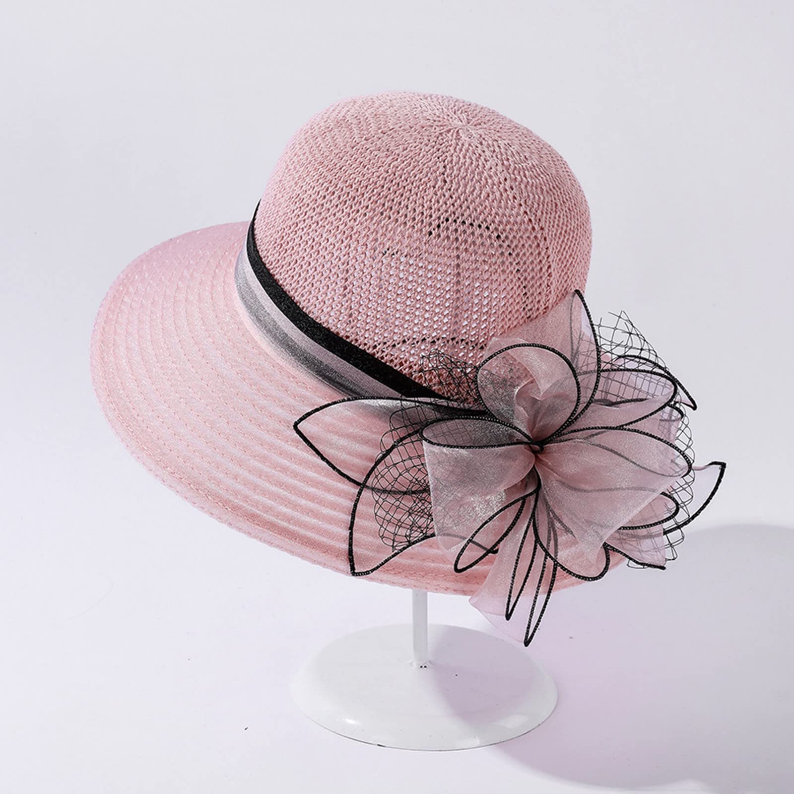 Derby tea party hat with bold floral detail for stylish occasions.