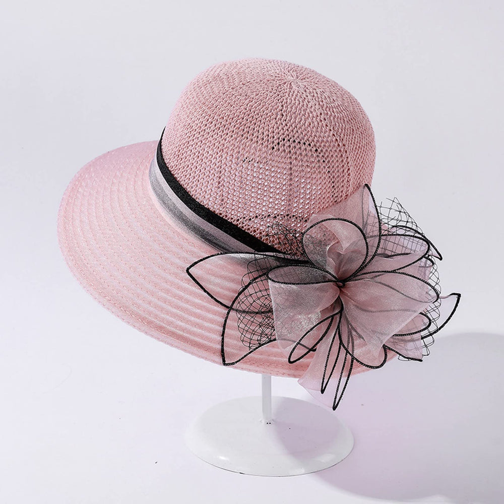 Derby tea party hat with bold floral detail for stylish occasions.