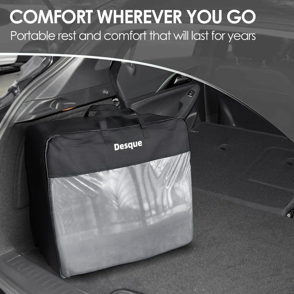 Desque mattress shown beside travel gear for camping trips.