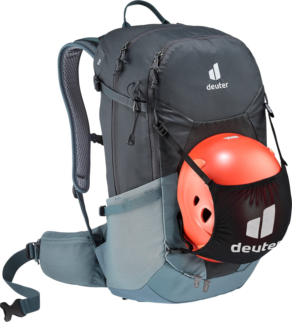 Deuter Futura 27 rain cover deployed on wet trails for reliable protection.