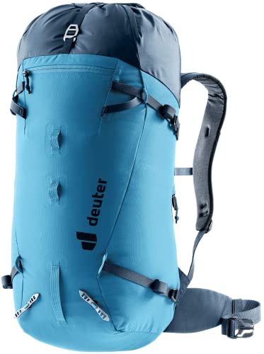 Deuter Guide 30L backpack side view showing compact fit and stability on rugged terrain