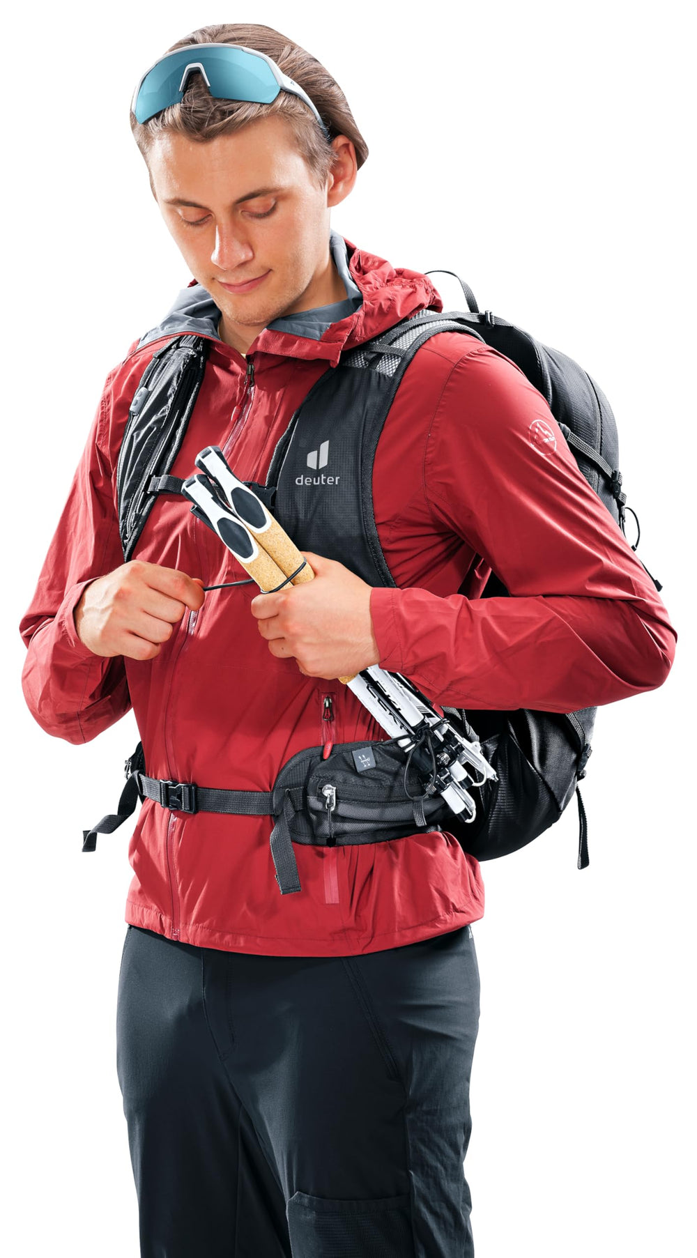 Deuter Speed Lite Pro 25L trekking pole attachment secures gear during climbs.