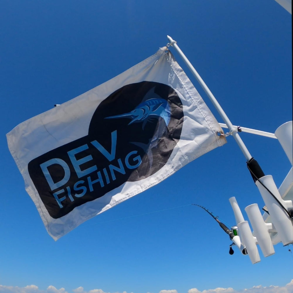 Dev Fishing 43-inch flag pole highlighting robust aluminum construction on deck
