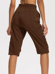 DEVOROPA women's hiking long shorts side view pocket highlights secure zipper pockets for valuables.