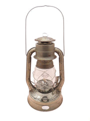 Dietz #8 Air Pilot lantern lit offers reliable light for emergencies and camping.