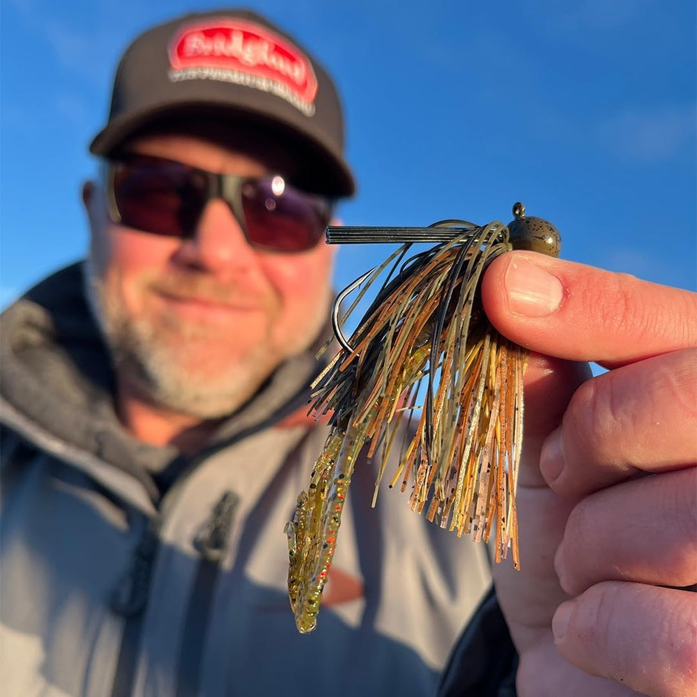 Arkie-style head Jig in action near rocks and wood cover.