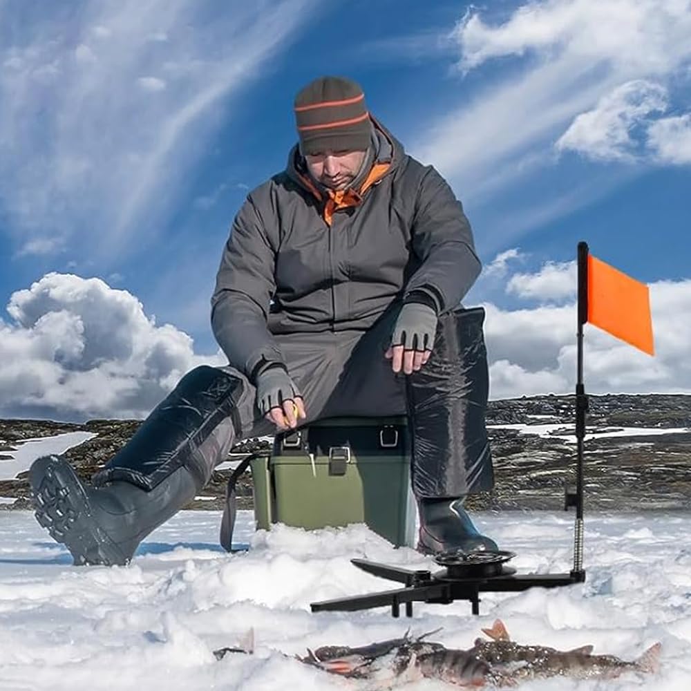 Angler using the tip-up on ice with alarm flag raised
