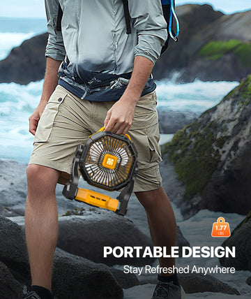 Doviluxe camping fan at the beach shows outdoor versatility