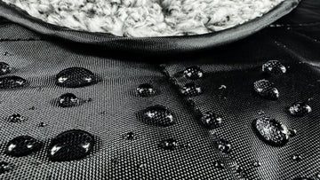 Down Under Outdoors blanket toggle cape feature frees hands for snacks and gear.