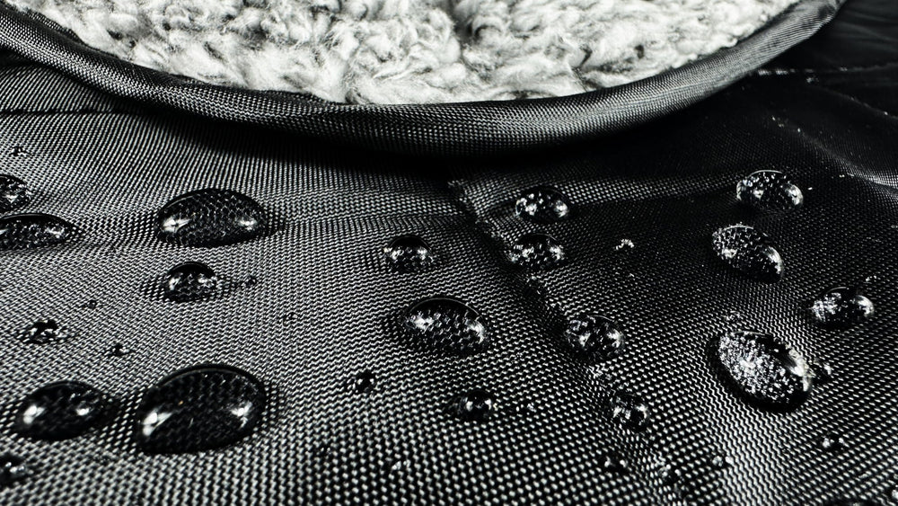 Down Under Outdoors blanket toggle cape feature frees hands for snacks and gear.