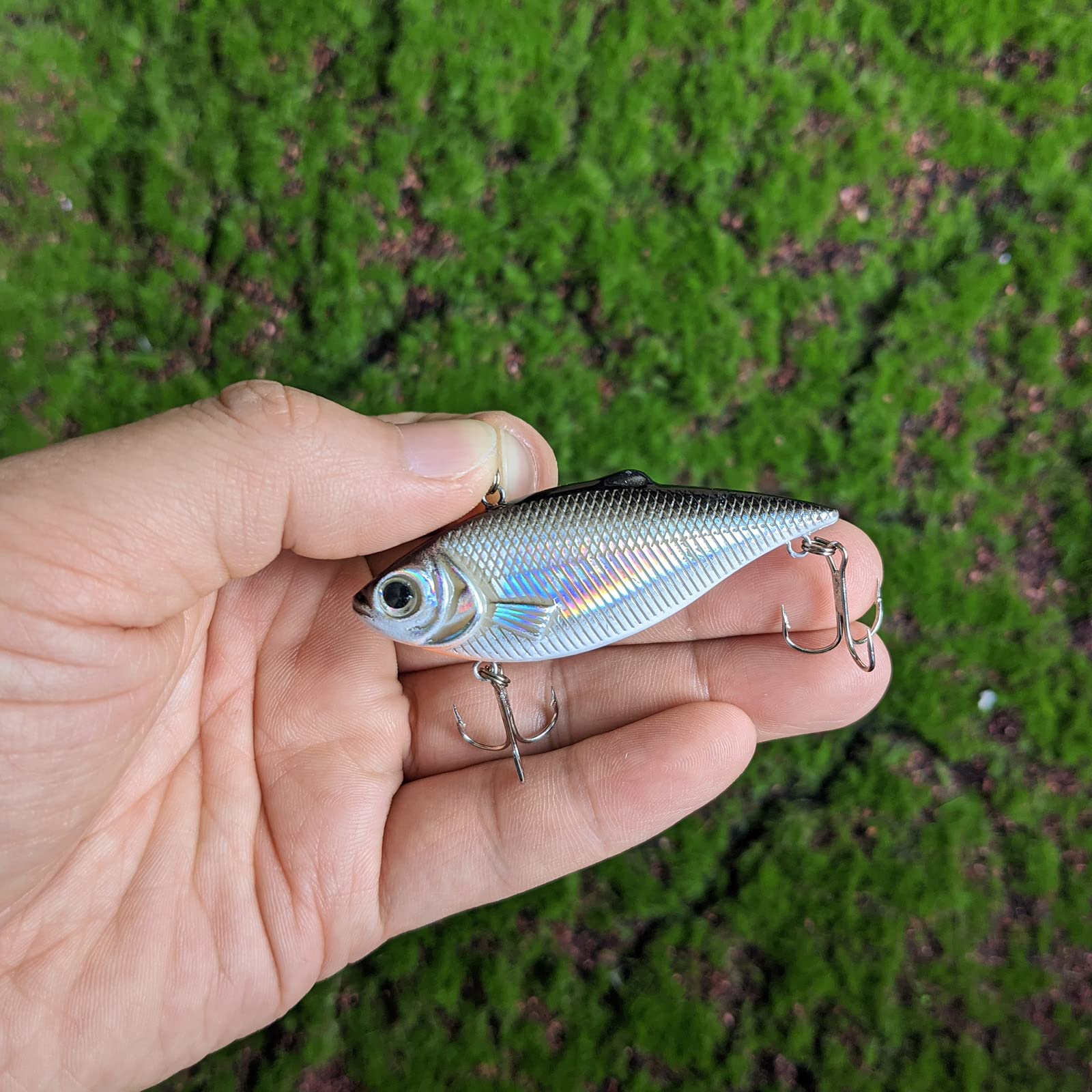 Close-up of reflective chrome laser paint and 3D eyes on the crankbait