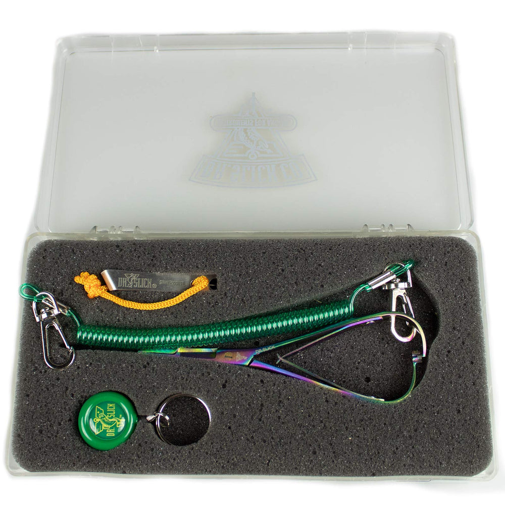 Dr. Slick Prism Mitten Clamp in a large fly box, ideal for precise knot tying and barb control
