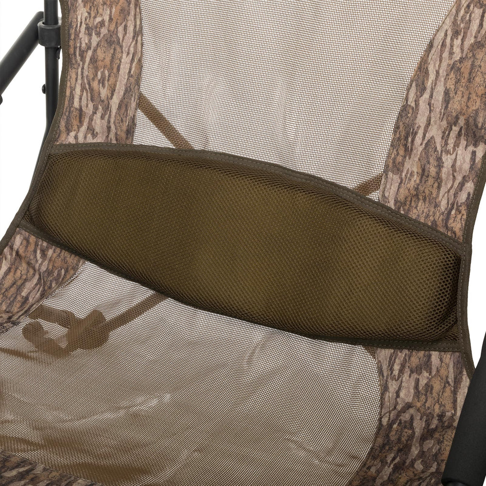 Drake Ol' Tom chair in use on marsh terrain illustrates comfortable seating.