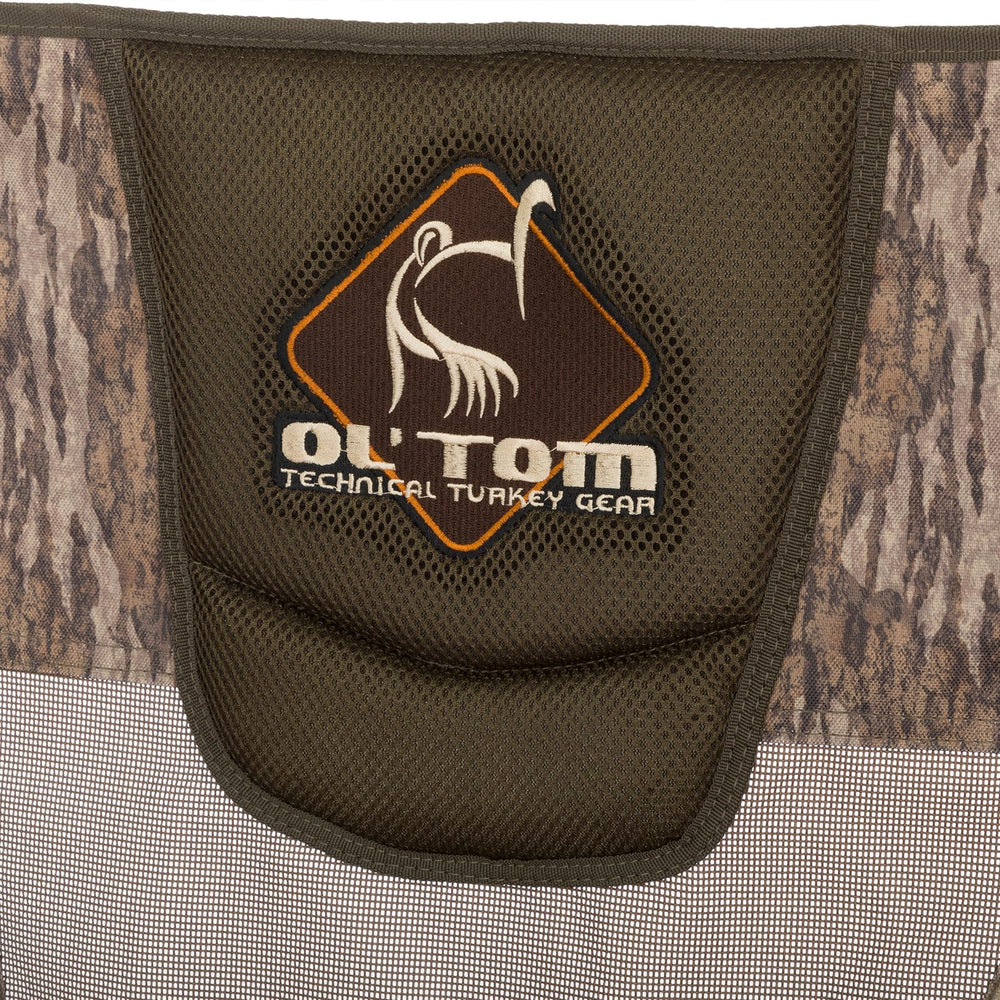 Drake Ol' Tom Mossy Oak Bottomland camo helps conceal in wetland surroundings.