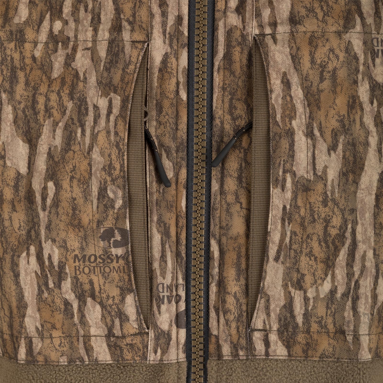Drake Waterfowl CommandXT Eqwader pockets enable quick access to calls and gear.
