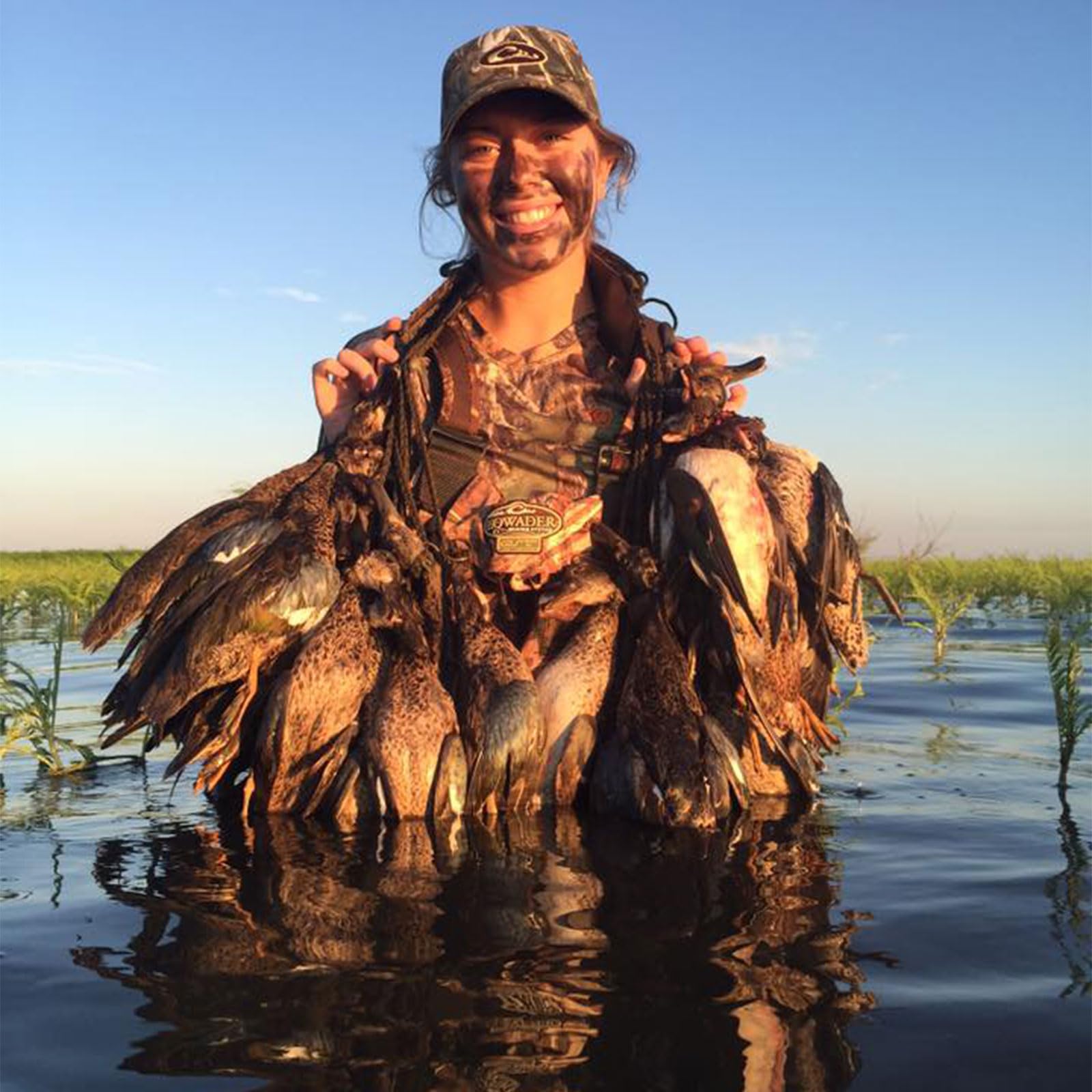 Drake Waterfowl Heavy Load Game Tote waist strap in use for stability during movement