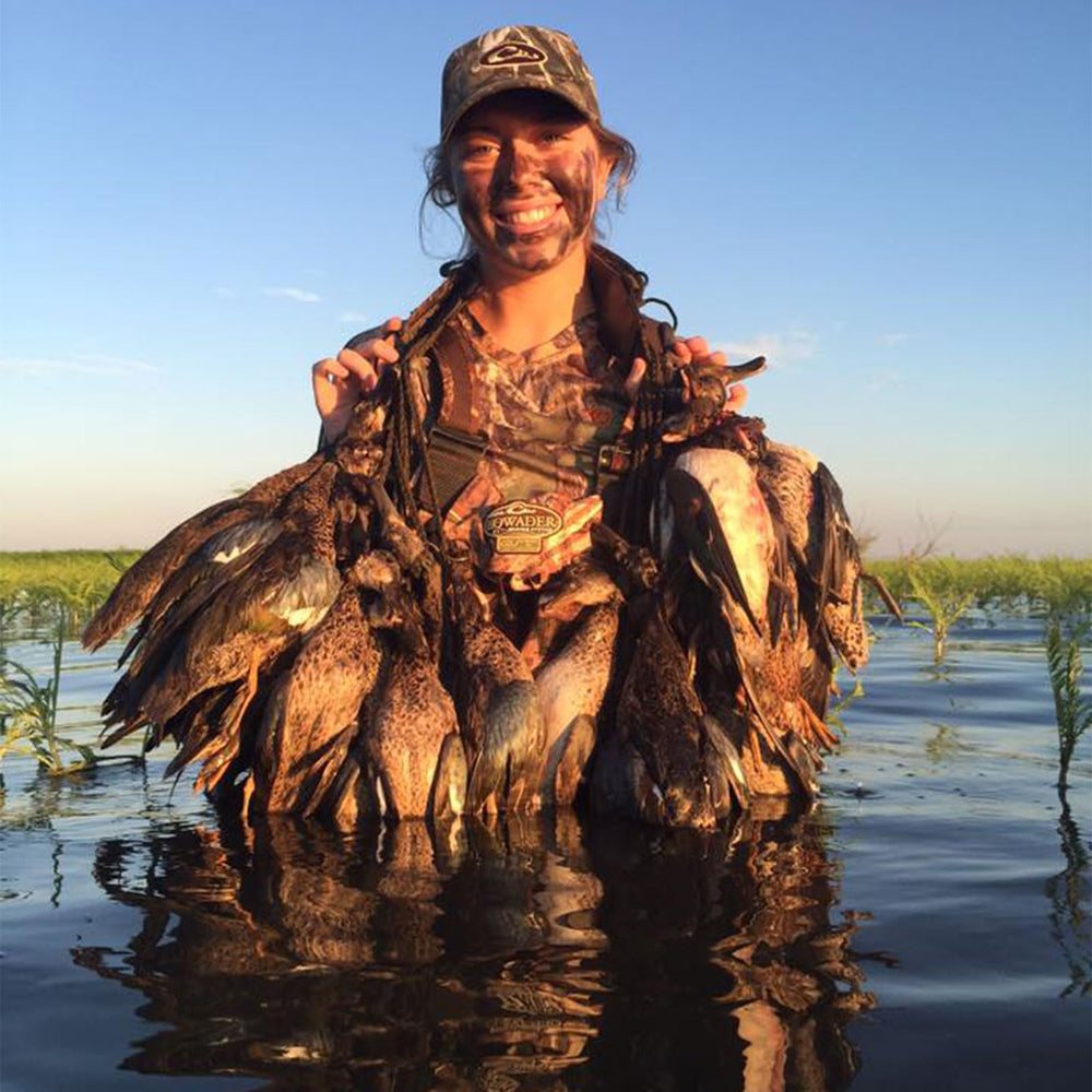 Drake Waterfowl Heavy Load Game Tote waist strap in use for stability during movement