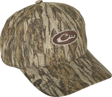 Drake Waterfowl men's waterproof camo cap, front view, conceals from above during hunts.