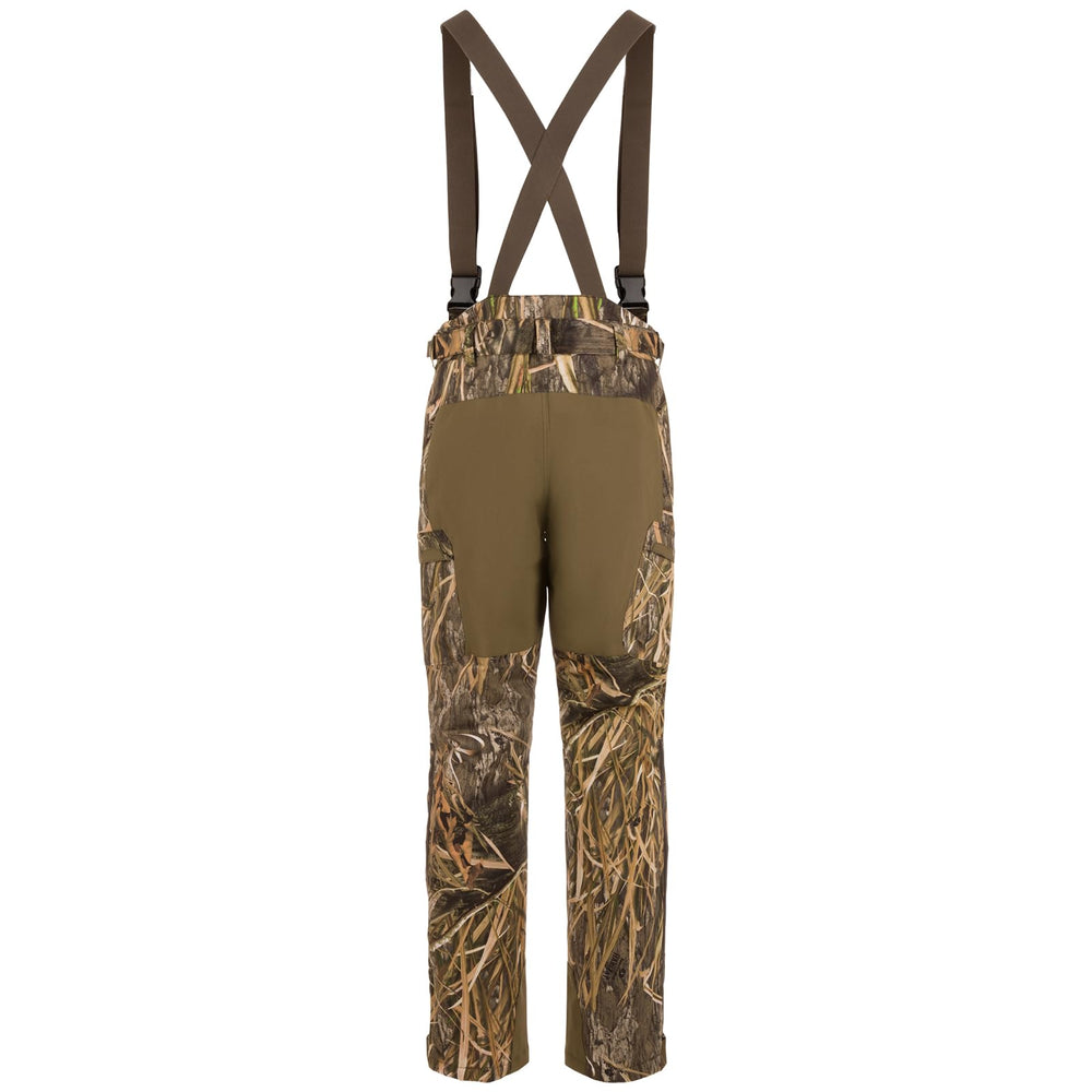 Drake Waterfowl MST waist-high insulated bib pocket detail for secure storage in wet conditions.