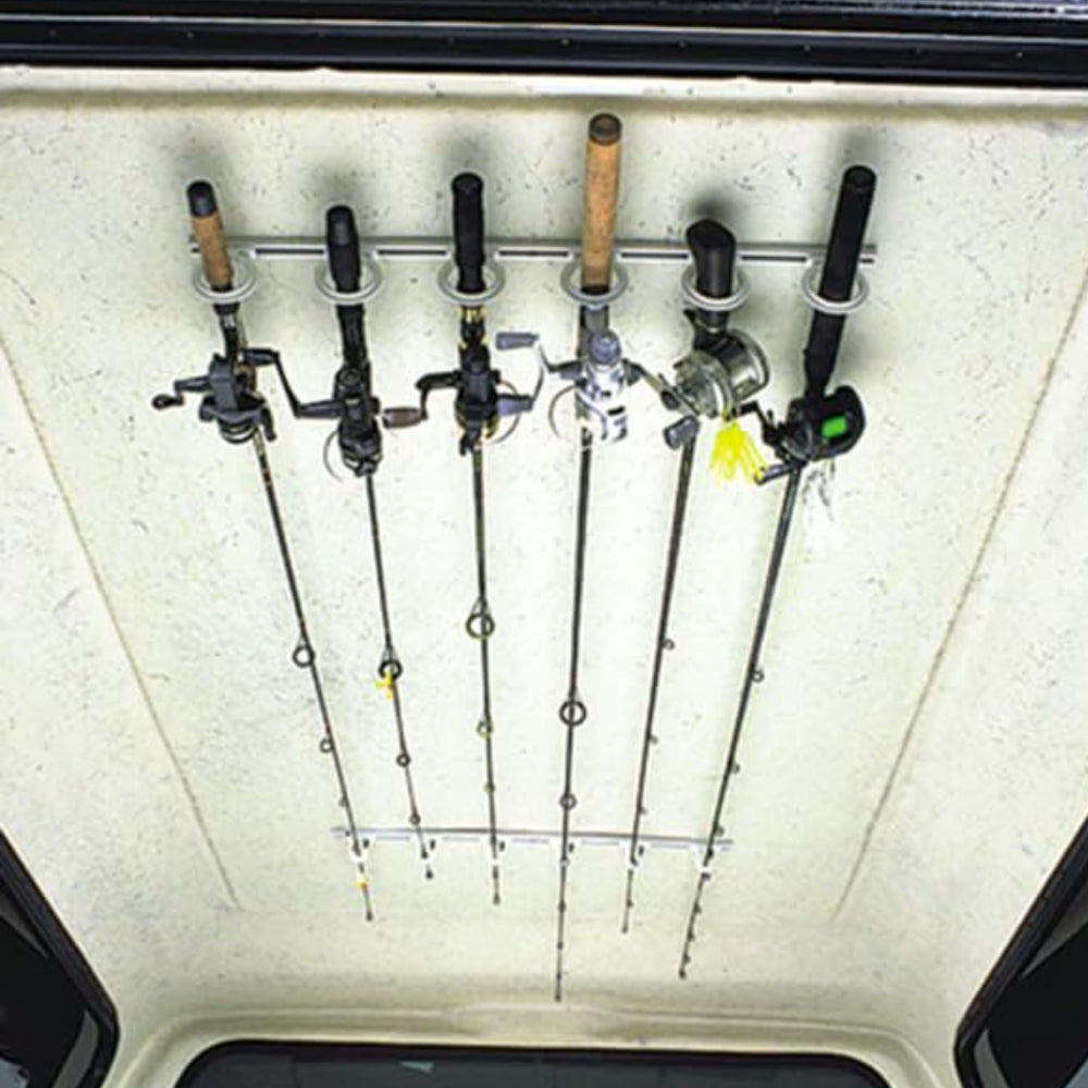 System holding up to six fishing rods securely in place