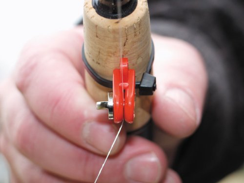 DU-BRO Drop Back Release mounted with plastic locking tie on rod