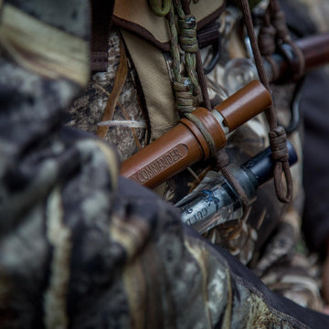 Duck Commander goose call featuring finger groove for secure, quiet handling.