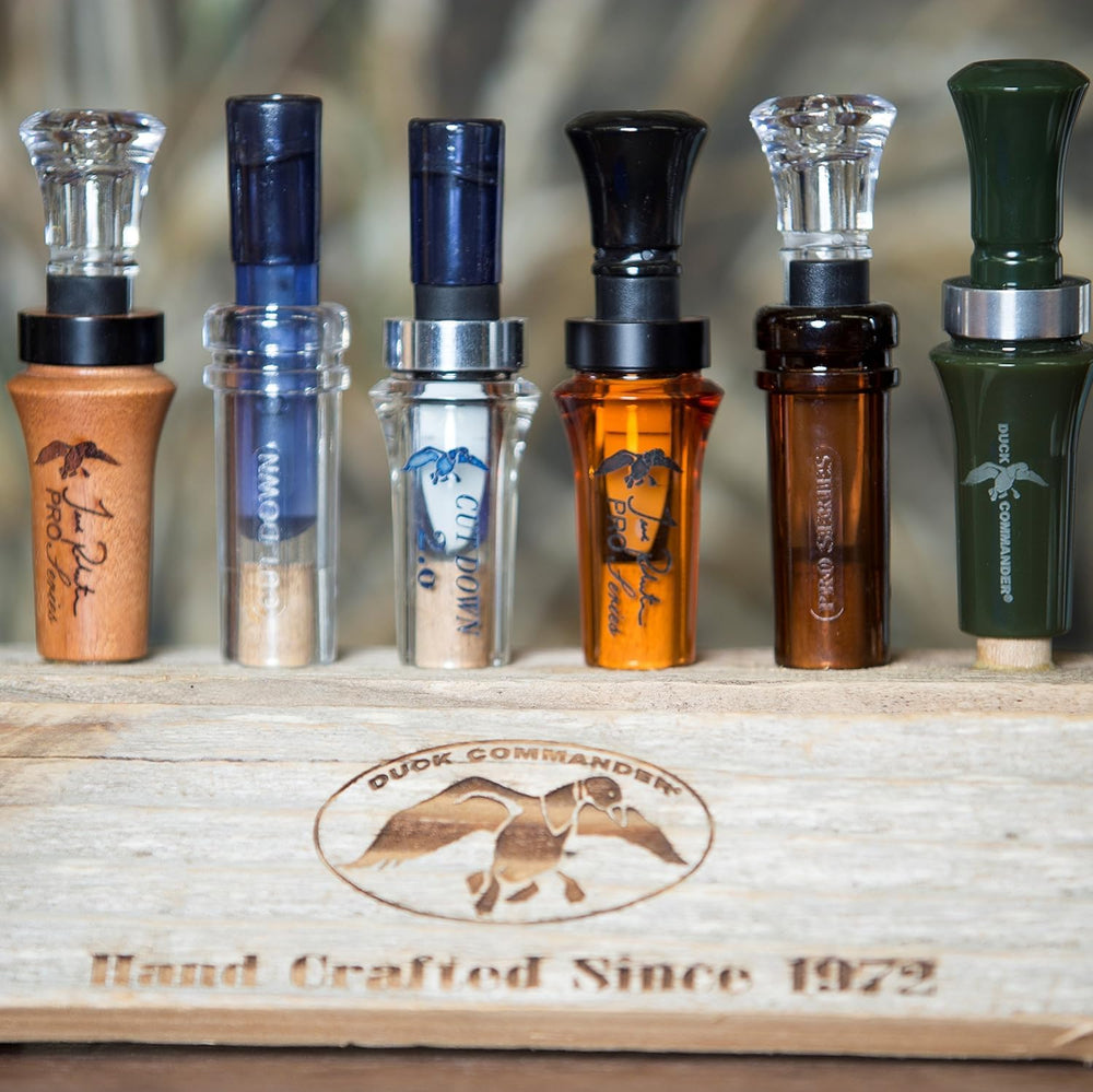 Duck Commander Jase Robertson Pro Series duck call on water shows high-end clarity.