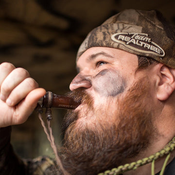 Duck Commander Jase Robertson Pro Series duck call open water scene shows versatile calling options.