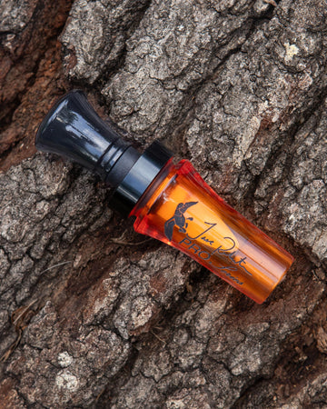 Duck Commander Jase Robertson Pro Series duck call orange acrylic barrel emphasizes durable field-ready construction.