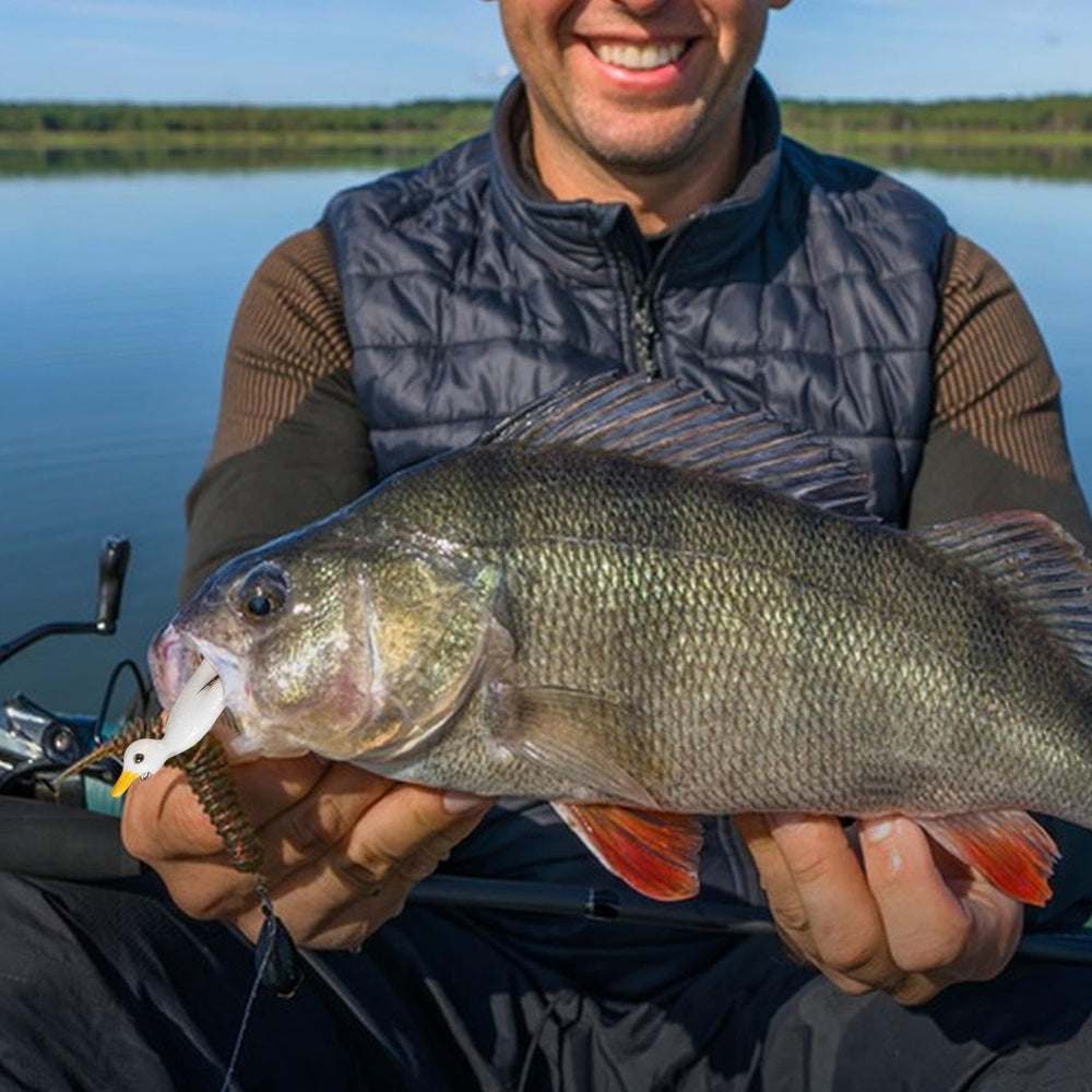 Duck Fishing Lure demonstrates swivel flippers rotating to create surface turbulence.