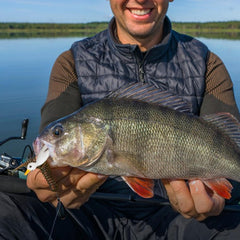 Duck Fishing Lure demonstrates swivel flippers rotating to create surface turbulence.