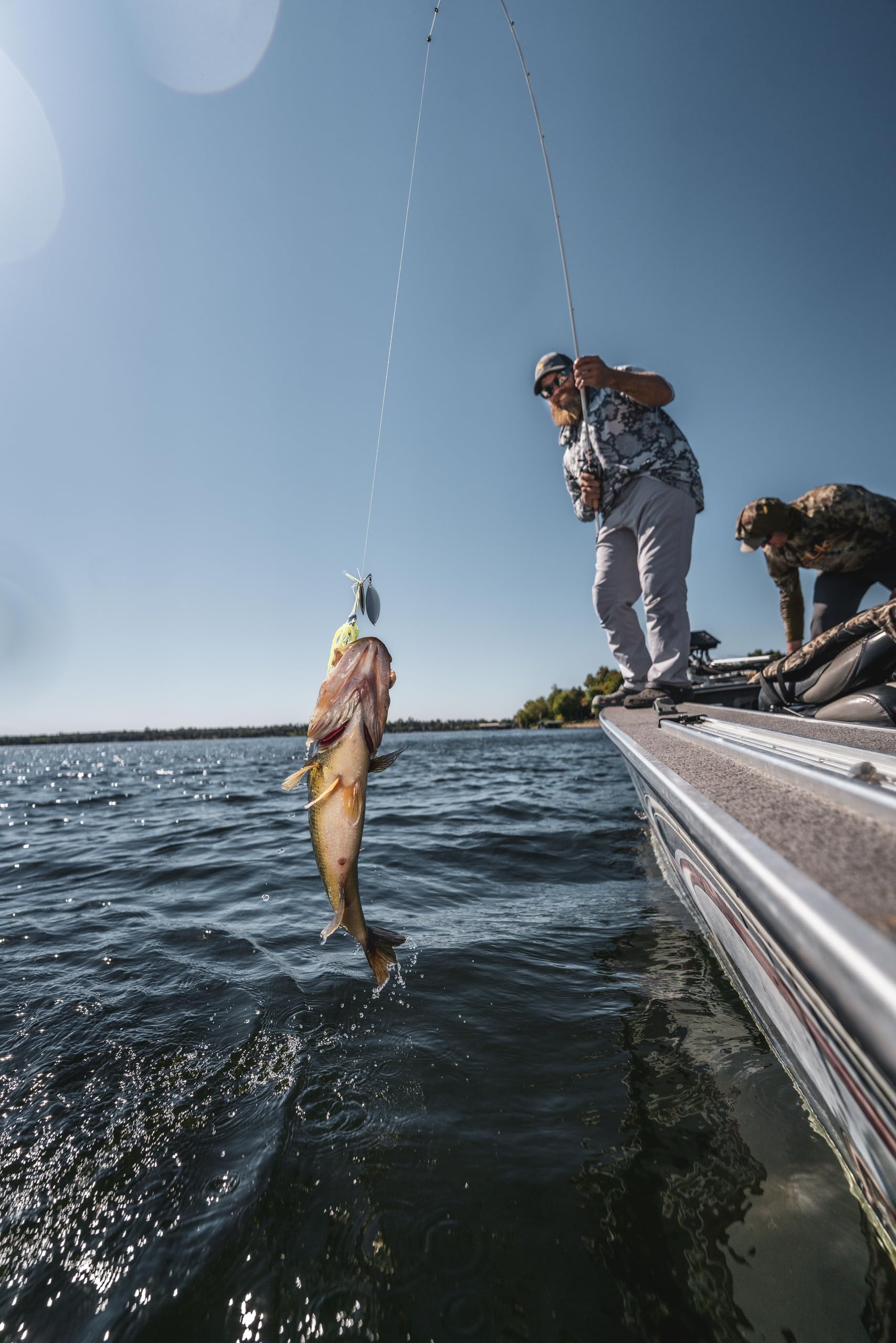Duckett Micro Magic Pro white-red color highlights visibility on the water.