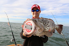 Duel Topknot leader close-up emphasizes tough, abrasion-resistant fluorocarbon for structure-rich casting.