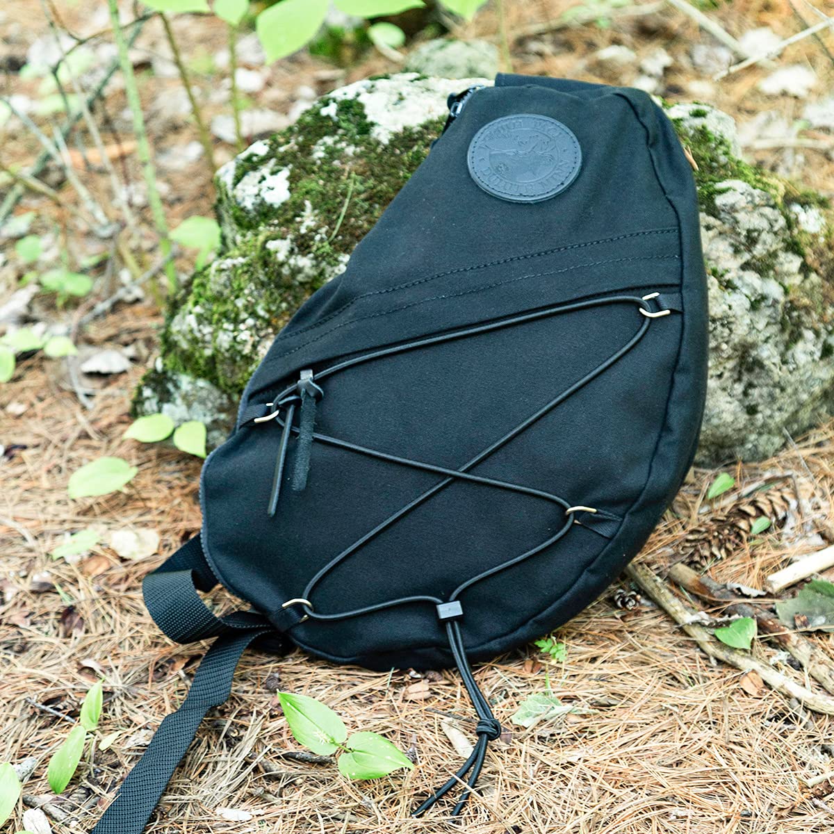 Duluth Pack Canvas Sling Pack leather-trim closeup, premium materials for everyday use.