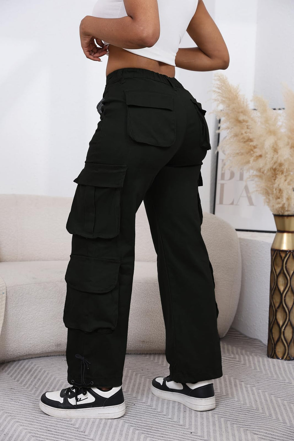 DvaeMalligo full-outfit black styling option illustrates versatile streetwear and casual hiking looks