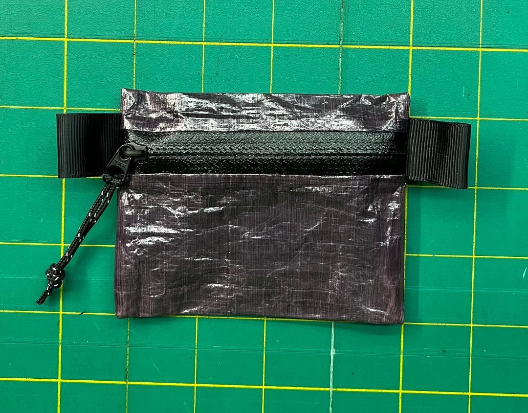 Dyneema Zipper Pouch Purple Haze, wallet-compact view, durable storage for cash, cards, and cosmetics.