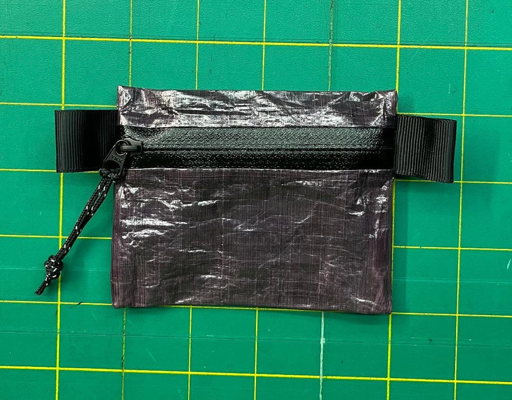 Dyneema Zipper Pouch Purple Haze, wallet-compact view, durable storage for cash, cards, and cosmetics.