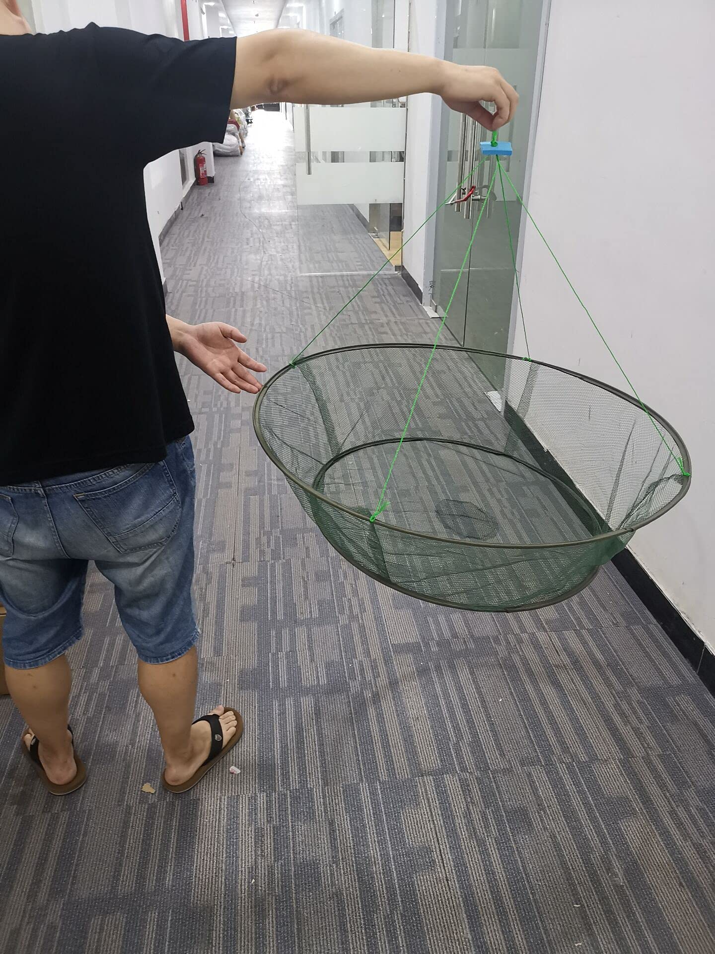 Foldable drop landing net showing steel wire and nylon construction