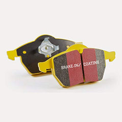EBC Yellowstuff brake pad backing plate detail emphasizes rotor-friendly synthetic material.