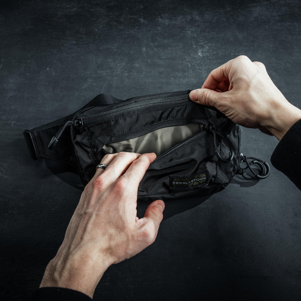 Eberlestock Bando Bag adjustable waist belt provides comfortable fit during activity.