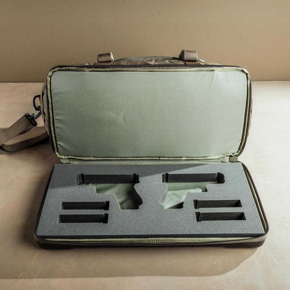 The Eberlestock Bang-Bang Range Bag adjustable-shoulder-harness enables easy transport to the range.