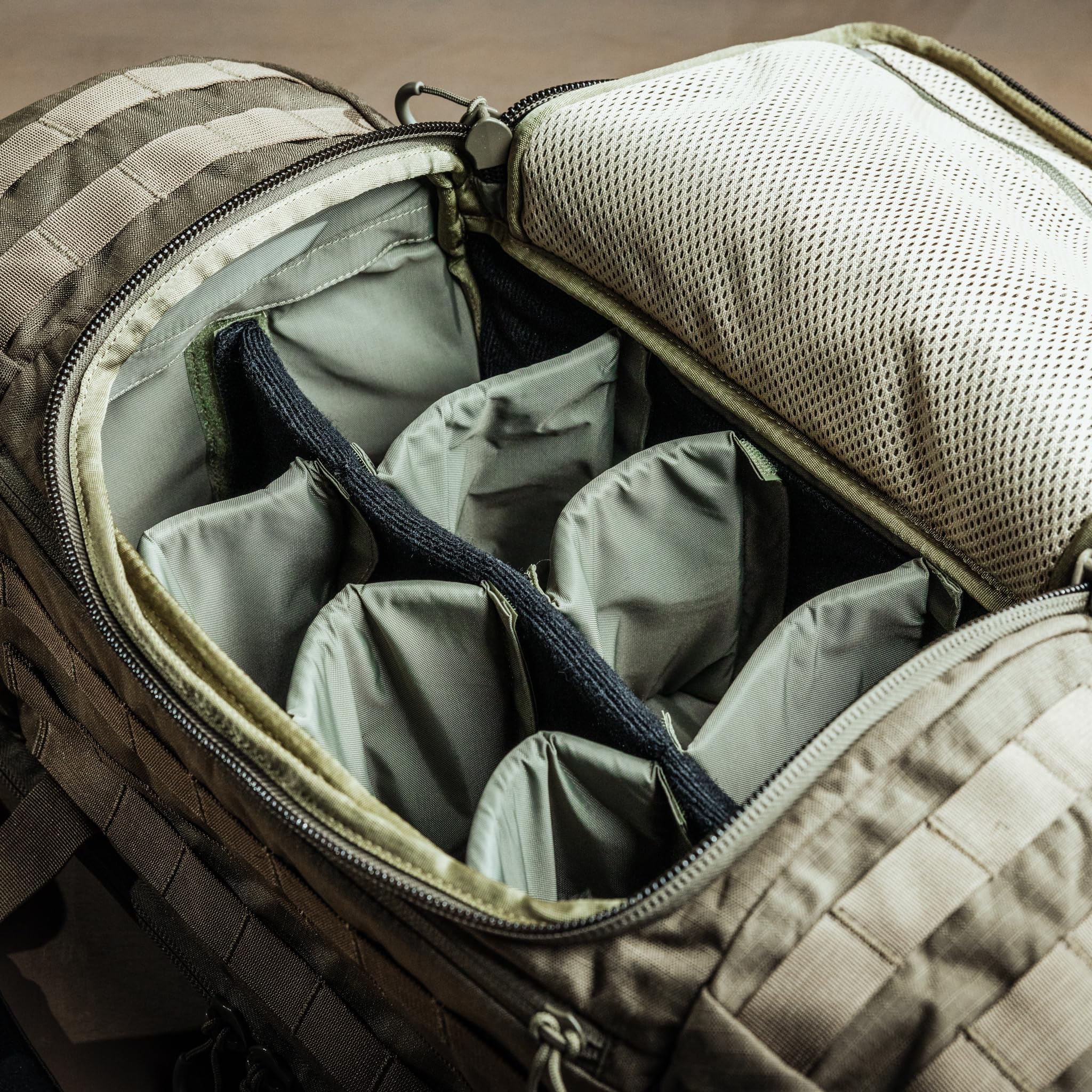 The Eberlestock Bang-Bang Range Bag exterior MOLLE webbing for expandable gear setup.